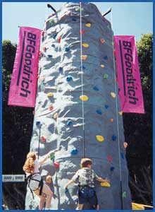 two climbers on a rock climbing wall