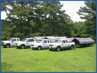 our trucks transporting the portable rock climbing walls