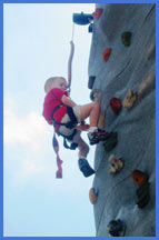 Boy climbing Portable Rock Wall